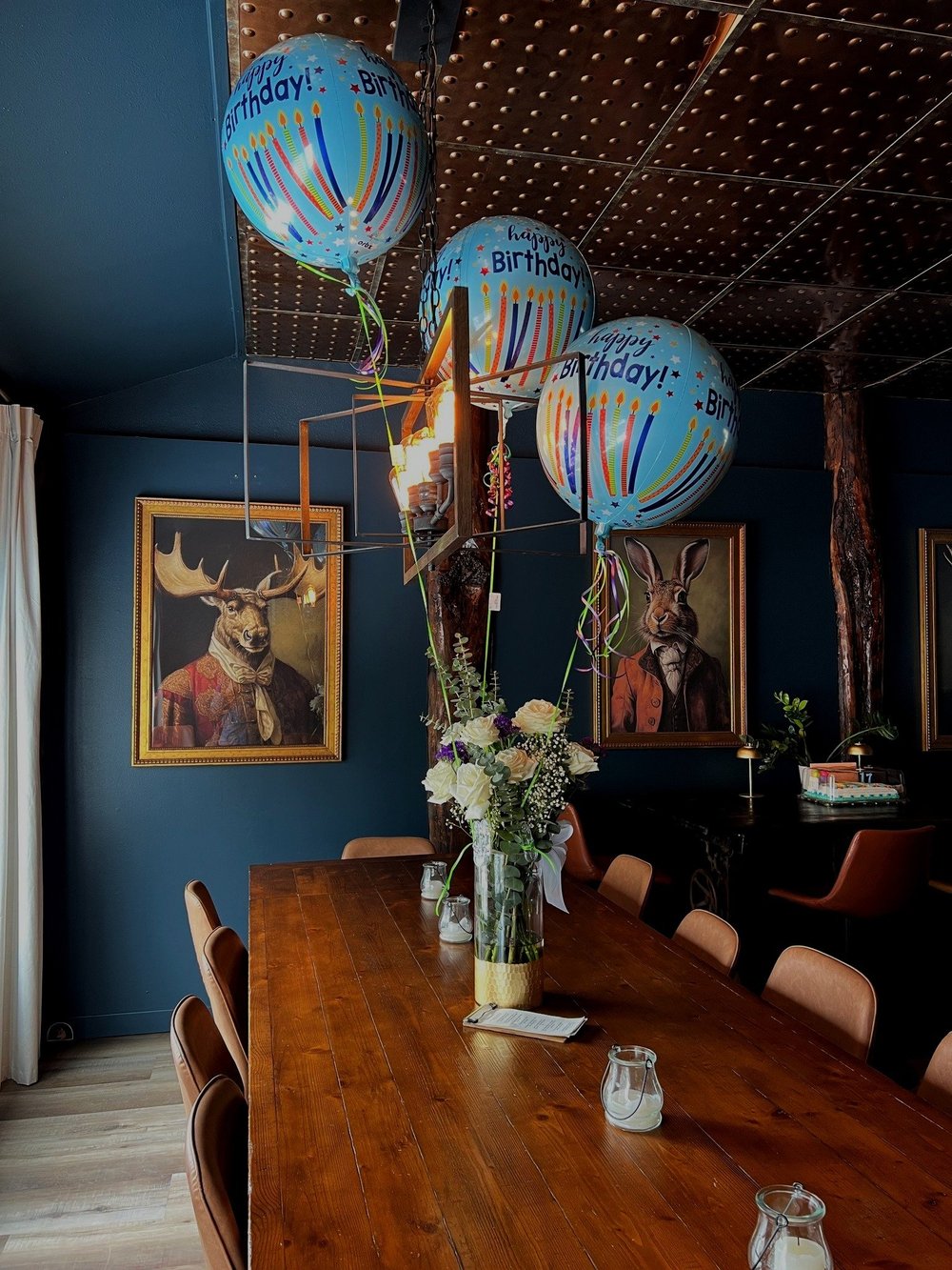 Private dining room at 2 Dad's Eatery and Taproom with a long wood table